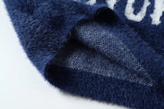 Jungwon Indigo “Don’t Burn Our Future” Knit Sweater