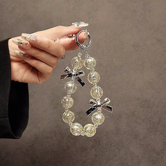 Bow Beaded Wrist Bag