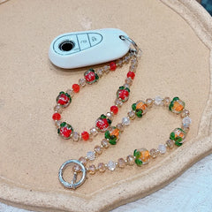 Luxury Persimmon Beaded Wristlet