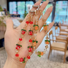 Luxury Persimmon Beaded Wristlet