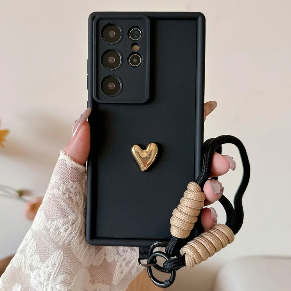 Samsung Galaxy Case with 3D Gold Heart Love Wrist Strap – For S25 Ultra, S24, S23, S22 Plus & More Models