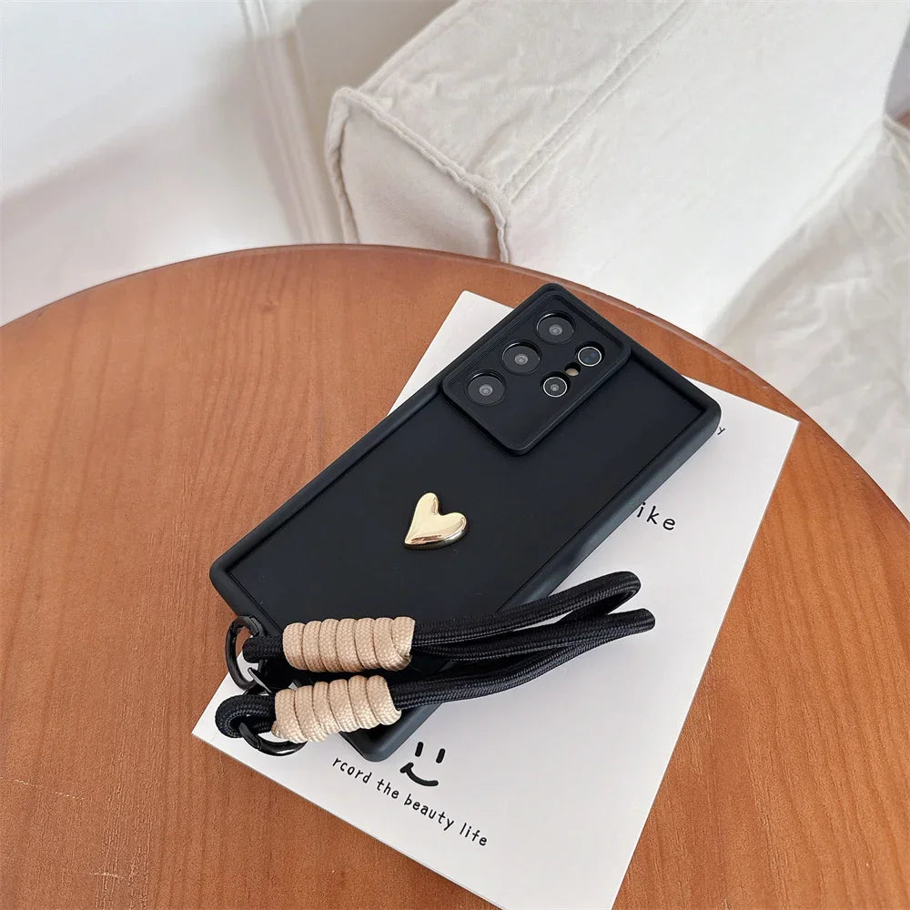 Samsung Galaxy Case with 3D Gold Heart Love Wrist Strap – For S25 Ultra, S24, S23, S22 Plus & More Models
