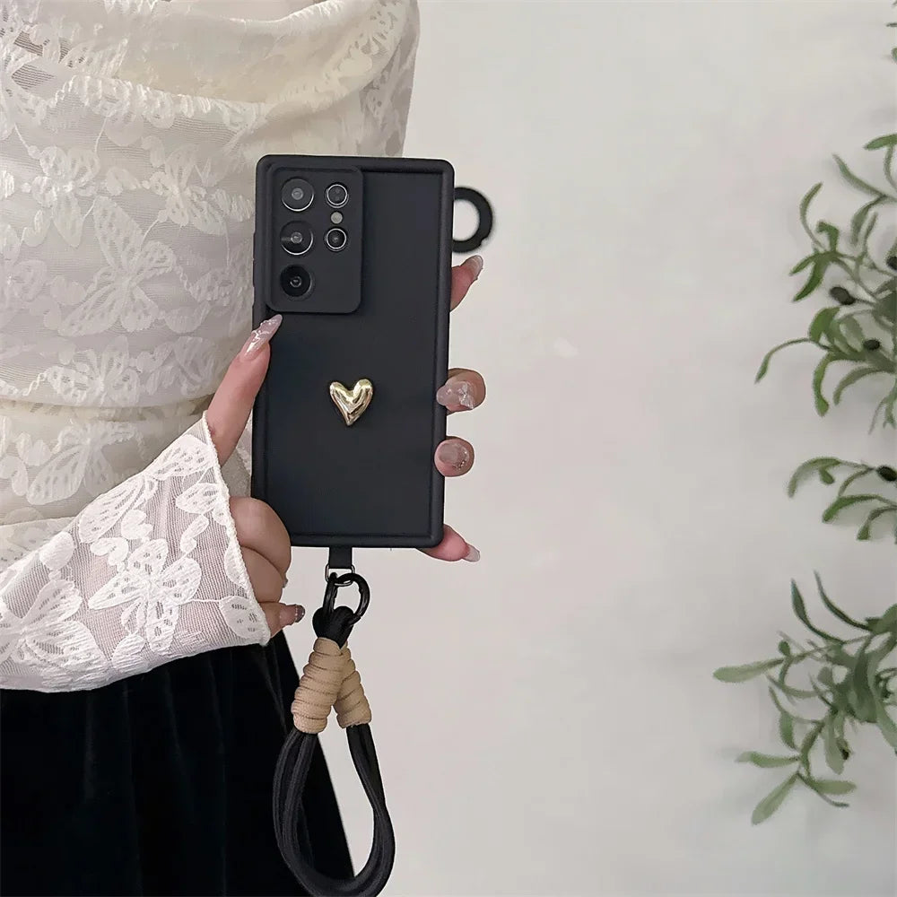 Samsung Galaxy Case with 3D Gold Heart Love Wrist Strap – For S25 Ultra, S24, S23, S22 Plus & More Models