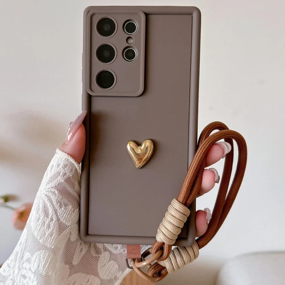 Samsung Galaxy Case with 3D Gold Heart Love Wrist Strap – For S25 Ultra, S24, S23, S22 Plus & More Models